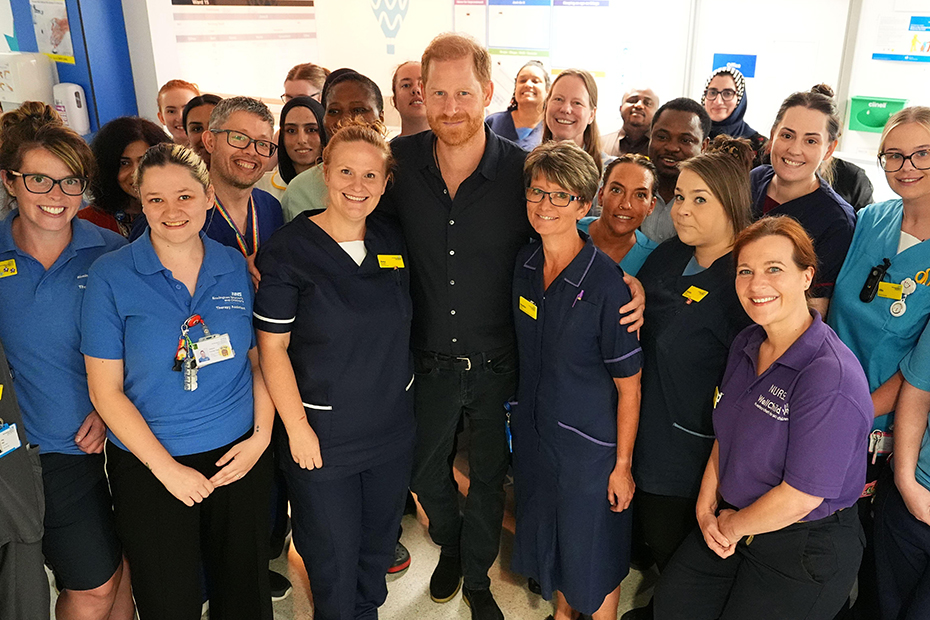 The Duke of Sussex, Patron of WellChild, poses for a photo with the medical staff during a visit to the Birmingham Children's Hospital to celebrate the 20th anniversary of the very first WellChild Nurse.